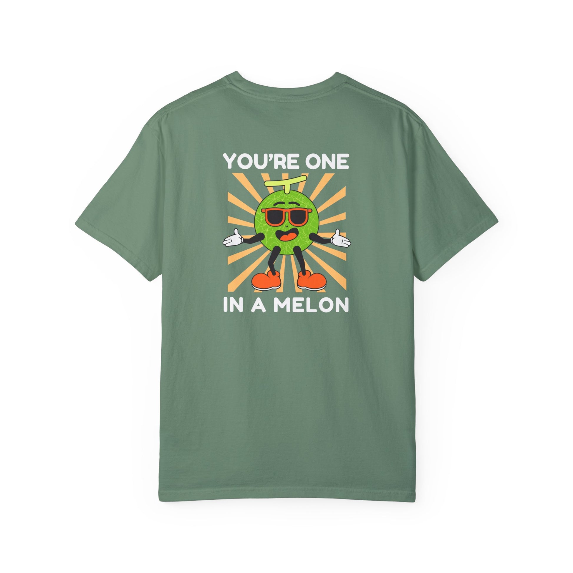 Light green unisex t-shirt with a large back design featuring 'You're One in a Melon' text and a smiling melon wearing sunglasses on a retro background, uplifting and fun graphic tee