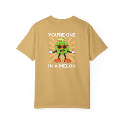 Mustard yellow unisex t-shirt with a large back design featuring 'You're One in a Melon' text and a smiling melon wearing sunglasses on a retro background, uplifting and fun graphic tee