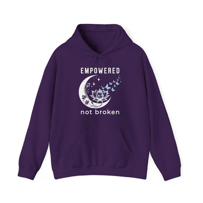 a purple unisex hoodie with text 'empowered not broken', featuring a moon and lotus with little flying butterflies