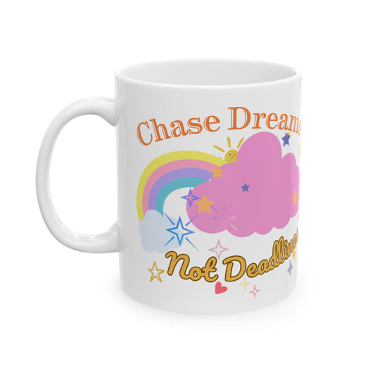 An 11 oz white ceramic coffee mug with phrase 'Chase Dreams, Not Deadlines' in bold lettering, featuring a rainbow soft pink cloud